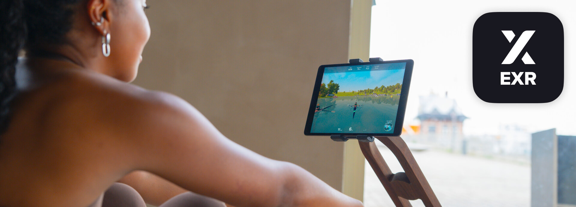 EXR indoor rowing app showing a virtual rowing environment